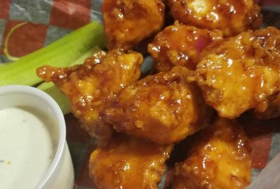 Jimmy B's boneless wings in basket with ranch